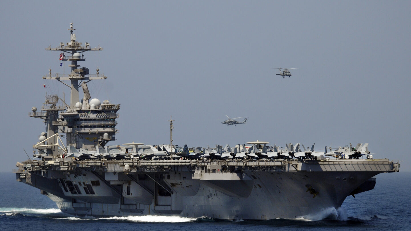 The aircraft carrier USS Carl Vinson transits the Strait of Hormuz.